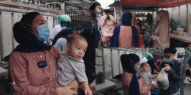 9 Portraits of Irish Bella's First Time Buying Takjil with Her Child, Baby Air Gets Excited Seeing the Crowded Streets