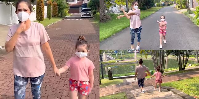 9 Portraits of Ussy Sulistiawaty Leaving the House for the First Time After Recovering from Covid-19, Inviting Sheva for a Jog around the Complex