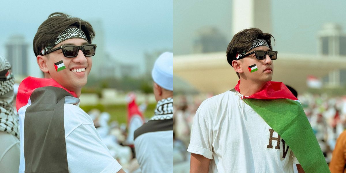 Participating in the Action at Monas, Here are 7 Photos of Harris Vriza Wearing the Palestinian National Flag on His Back as a Sign of Support