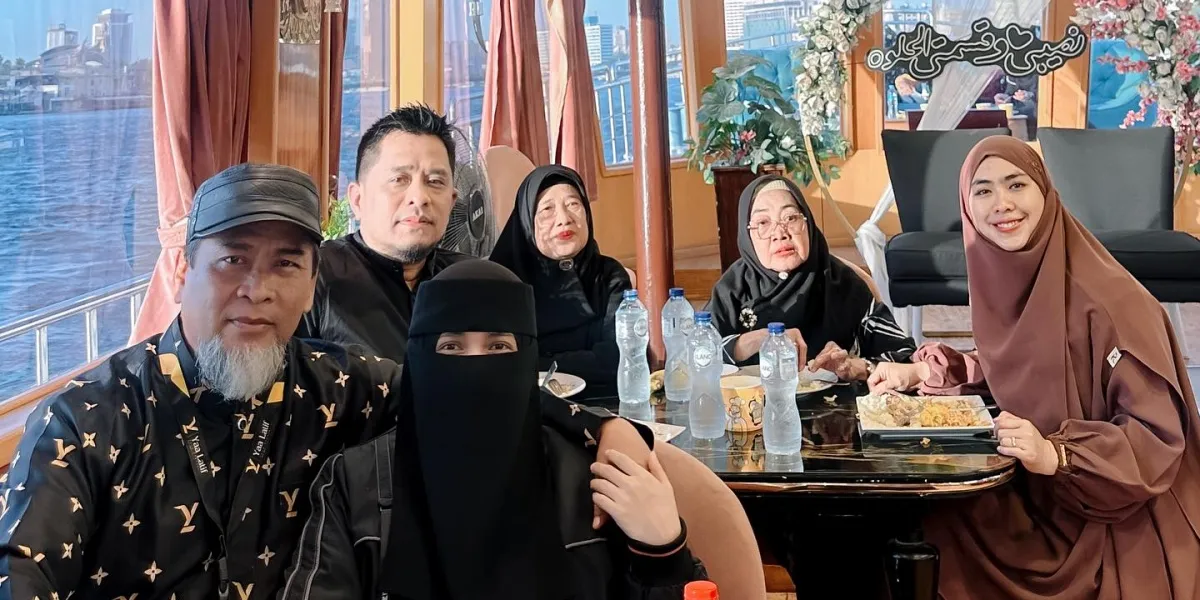 Studying in Egypt, Portrait of Oki Setiana Dewi on a Boat along the Nile River