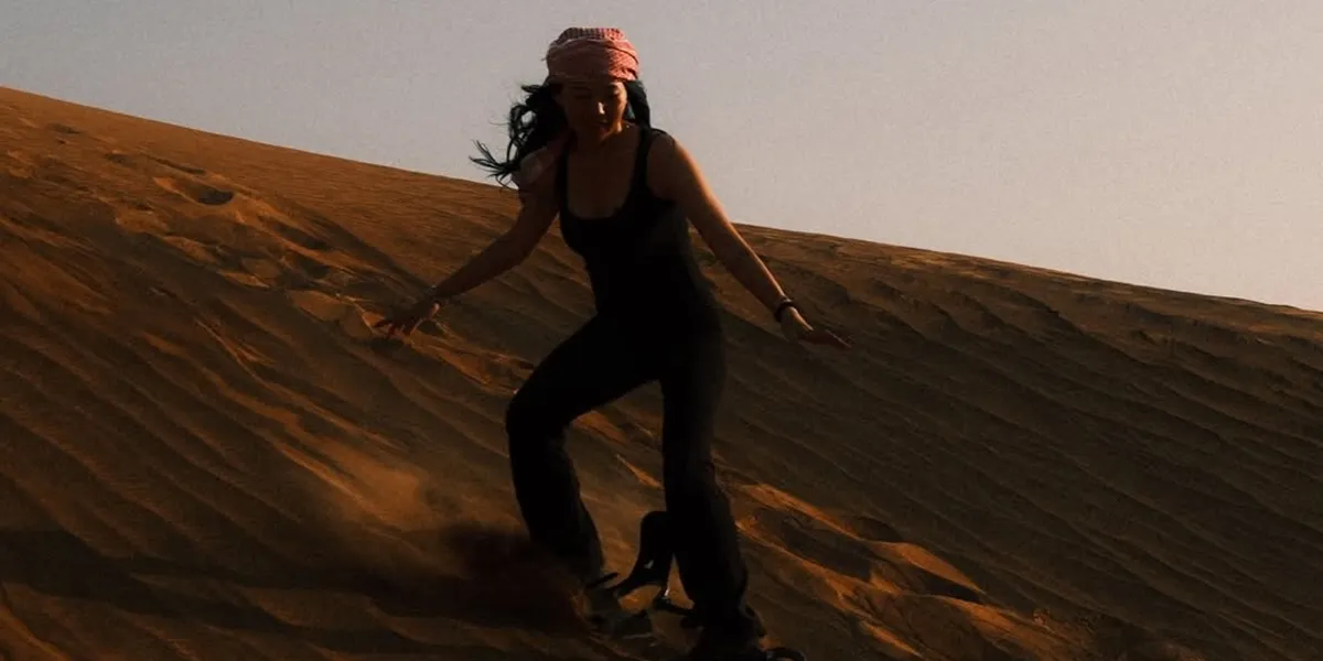 Exciting Moment of Wendy Walters Sliding on the Sand Dunes in Dubai