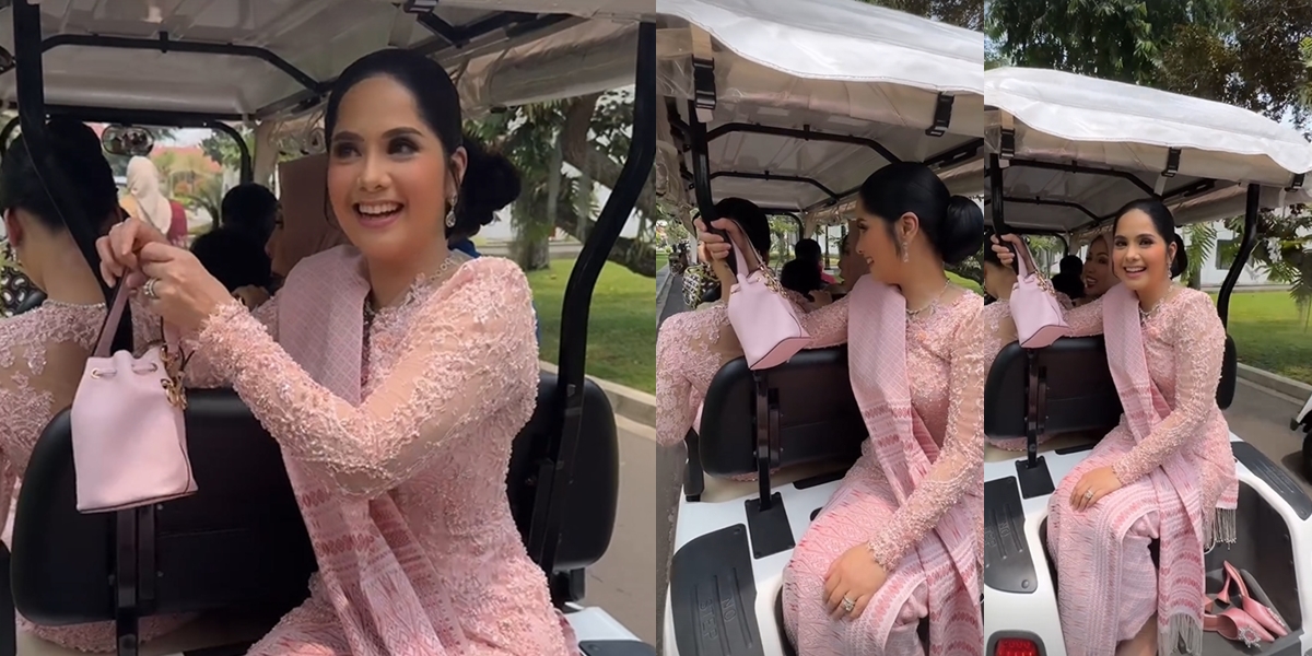 Portrait of Annisa Pohan Relaxing Sitting Facing Back While Riding a Buggy Car at the State Palace, Not Pretentious