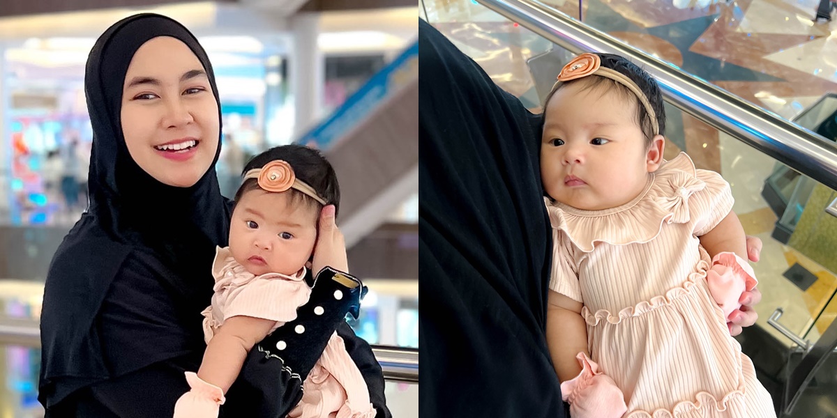 Portrait of Aqila, Anisa Rahma's Youngest Child, Who is Two Months Old and Very Chubby, Received Hand-Me-Down Clothes from Her Twin Siblings