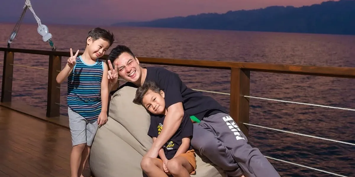 Portrait of Baim and Paula Attending Together at Their Child's School Event, Fully Supporting Kiano