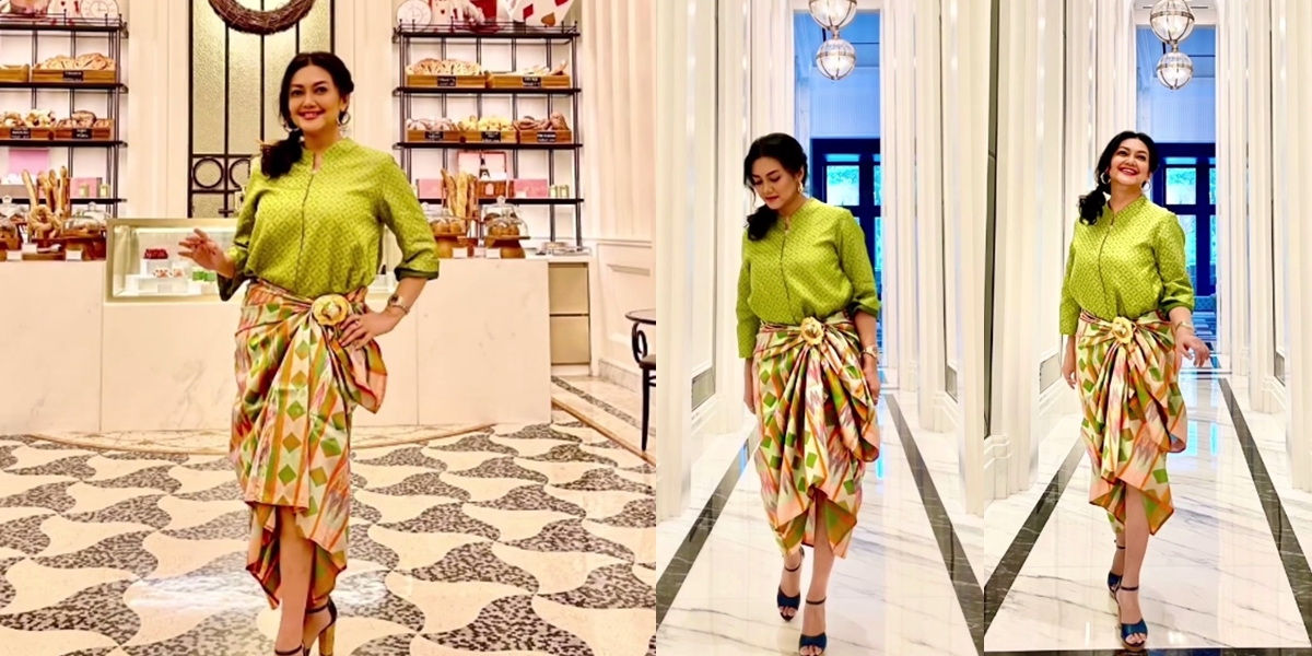 Portrait of Bella Saphira Confidently Wearing Sarong and Entering Luxury Hotel, Still Beautiful!