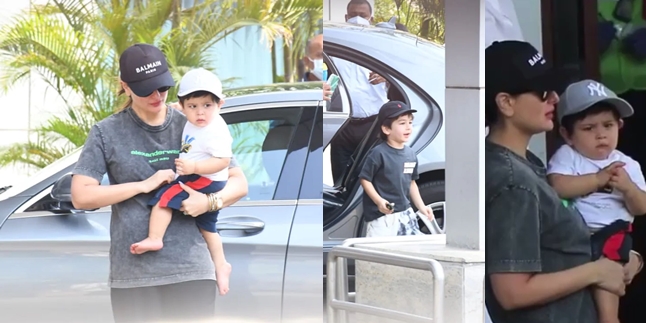 Portrait of Kareena Kapoor Departing for Vacation, Taimur and Jeh Cheerfully Greet Paparazzi