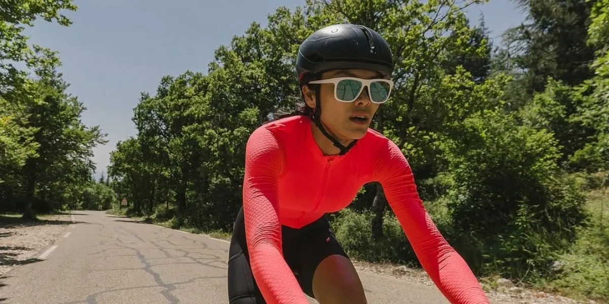 Portrait of Kelly Tandiono Cycling Up the Brutal 21 KM Climb on Mount Ventoux in France