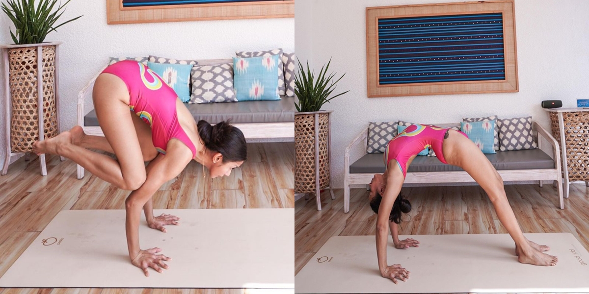 Portrait of Kirana Larasati who is very flexible during Yoga, wearing a pink swimsuit and showing off her smooth back