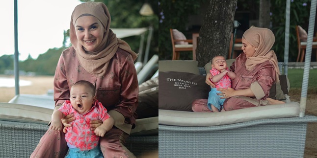 Cute Portraits of Baby Air Rumi Wearing a Shirt While on Vacation in Bali, Playing at the Beach with Irish Bella