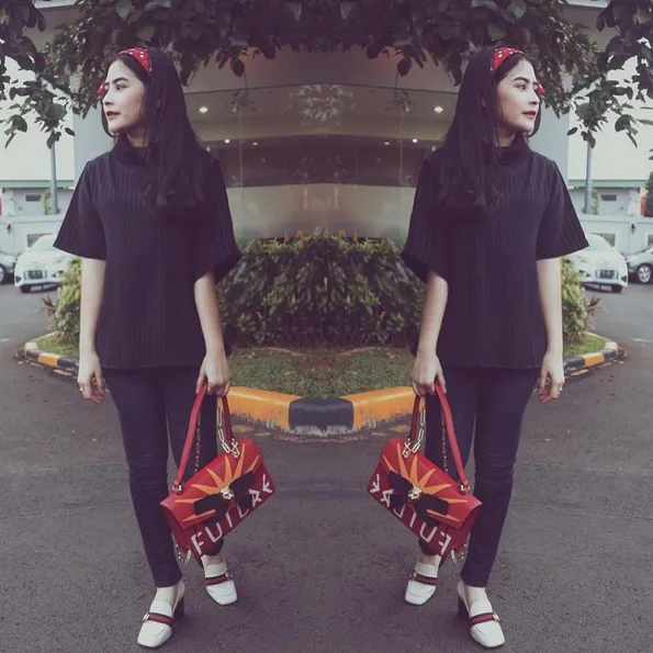 Tak hanya tampil feminin, Prilly juga kerap hadir dengan look yang berbeda. /©instagram.com/prillylatuconsina96
