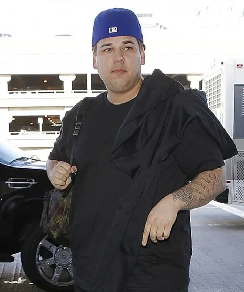 Rob sedang berjuang menurunkan berat badan atau berhenti dari kecanduan sih? @ dailymail.co.uk/X17online.com