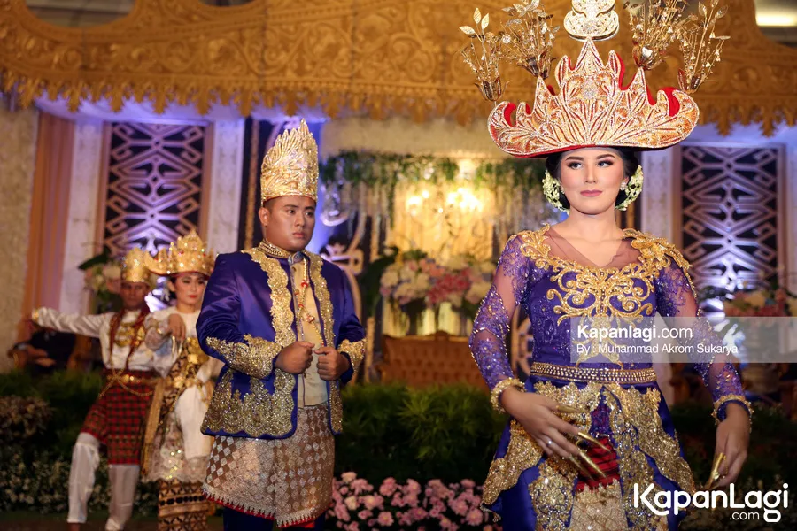 Selena dan Febry menikmati momen mudik © KapanLagi.com/Muhammad Akrom Sukarya