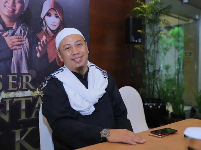 Opick cerita soal pengalamannya saat manggung. © Bintang/Adrian Utama Putra