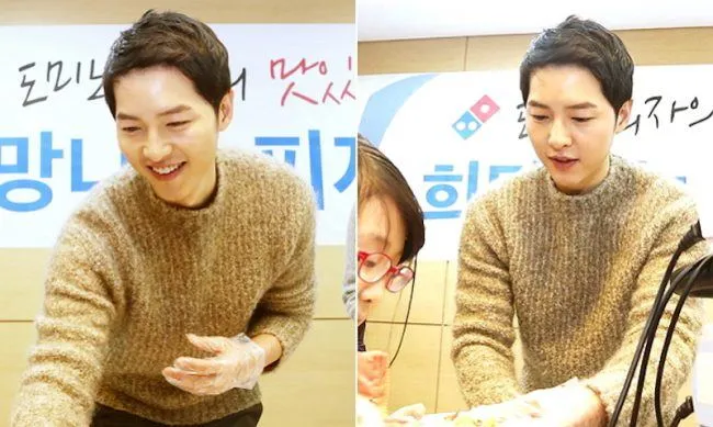 Song Joong Ki saat membagikan pizza gratis di Rumah Sakit Anak Seoul National University. ©koreaboo.com