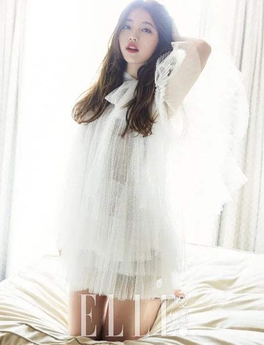 Suzy Miss A tampil cantik cute tapi juga sekaligus menggoda dalam pemotretan Elle Korea. ©Naver.co.kt