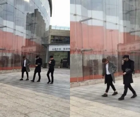 Tao EXO saat tertangkap kamera fans sedang merokok di tempat umum. @exo-love.com