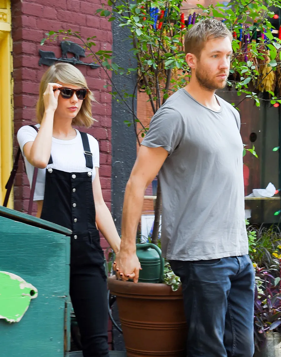 Taylor dan Calvin digosipkan break © Splashnews.com