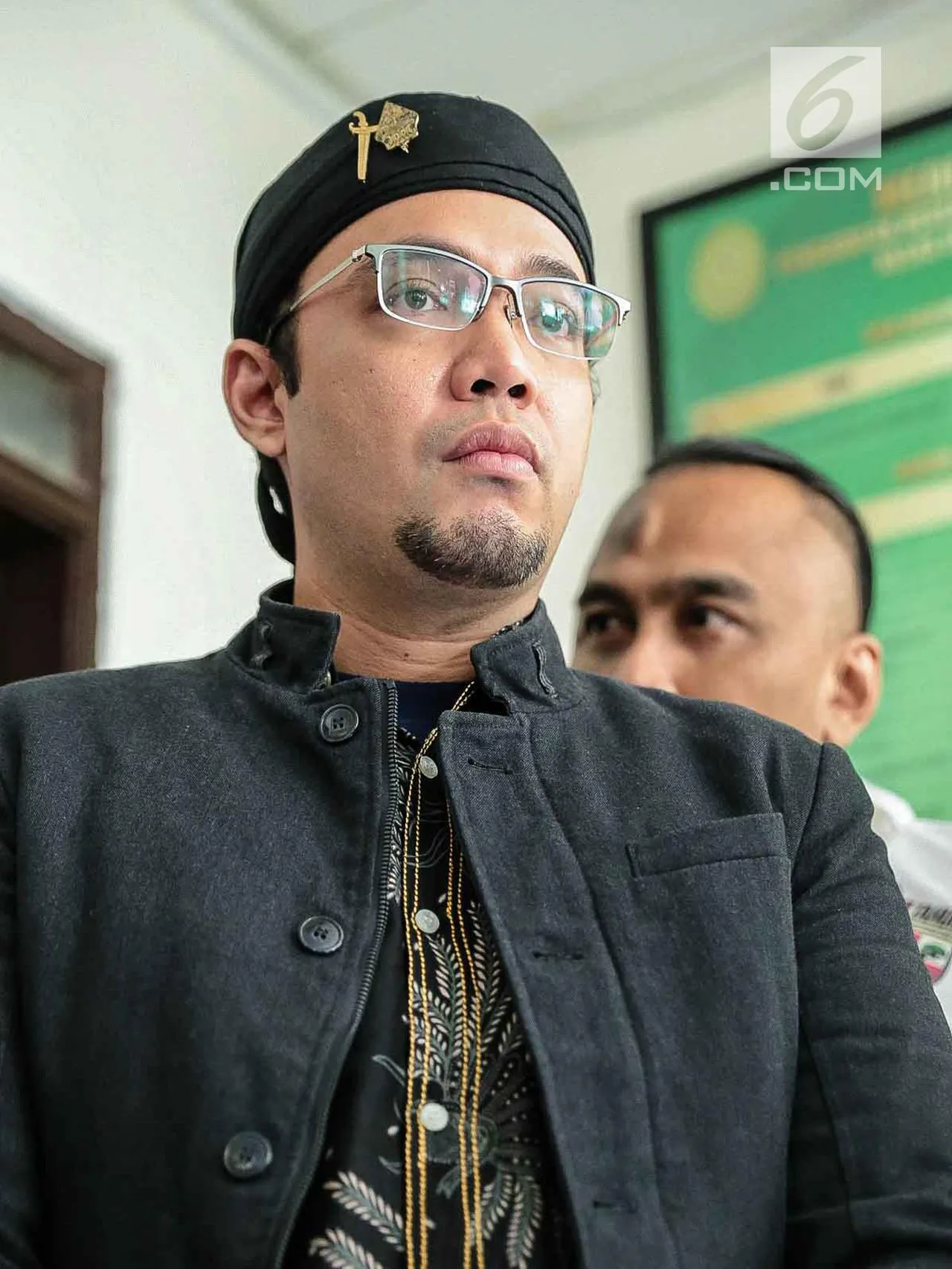 Sandy Tumiwa menginginkan hak asuh anak. (Credit: via liputan6.com)