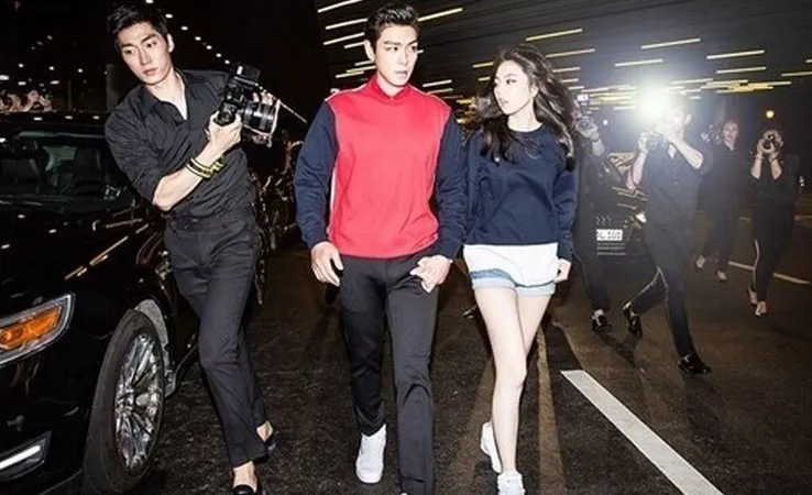 T.O.P dan Sohee seperti dua bintang papan atas yang tengah berpacaran. ©soompi.com
