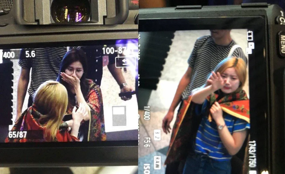 Sana dan Dahyun tampak menghapus air mata © Istimewa