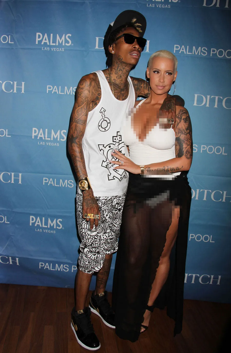 Wiz Khalifa dan Amber Rose dikabarkan tinggal bersama © Fameflynet