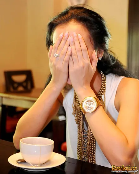 Foto Atiqah Hasiholan