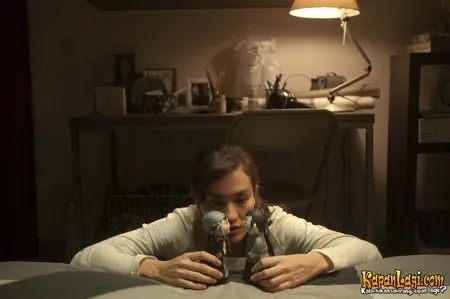 Foto Atiqah Hasiholan