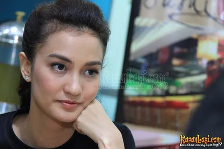 Foto Atiqah Hasiholan