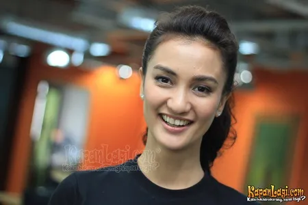 Foto Atiqah Hasiholan