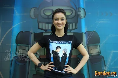 Foto Atiqah Hasiholan