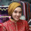 Dhini Aminarti