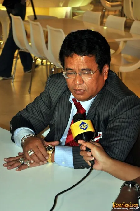 Foto Hotman Paris Hutapea