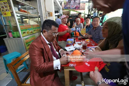 Foto Hotman Paris Hutapea