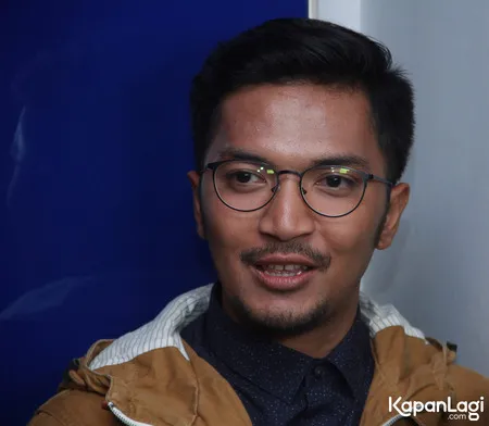 Foto Ihsan Tarore