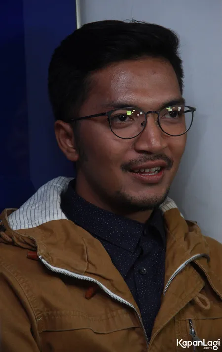 Foto Ihsan Tarore