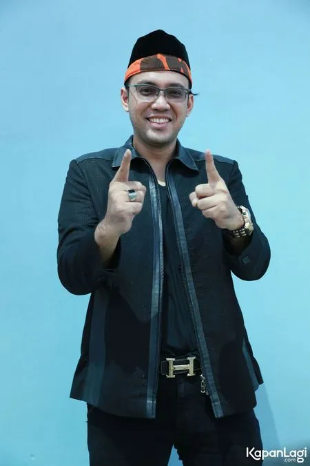 Foto Sandy Tumiwa