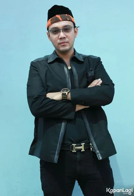 Foto Sandy Tumiwa