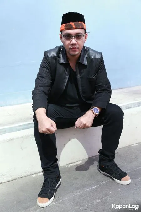 Foto Sandy Tumiwa