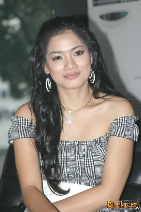 Foto Titi Kamal