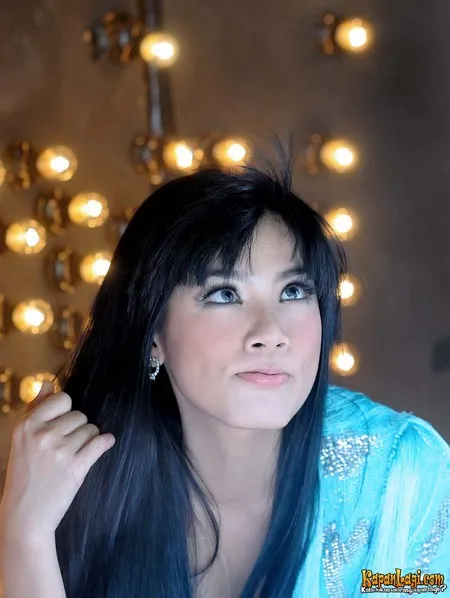 Foto Titi Kamal