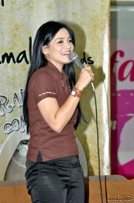 Foto Titi Kamal