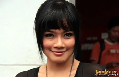 Foto Titi Kamal