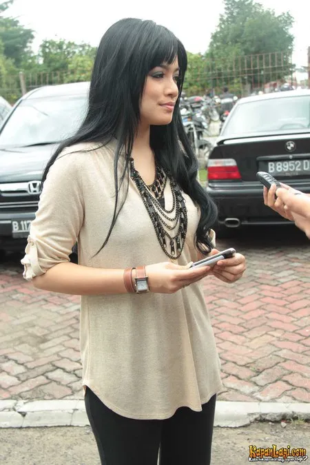 Foto Titi Kamal