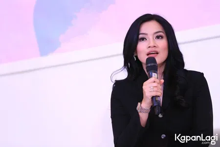 Foto Titi Kamal