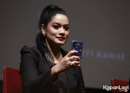 Foto Titi Kamal