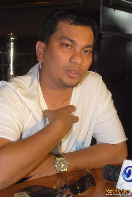 Foto Tompi