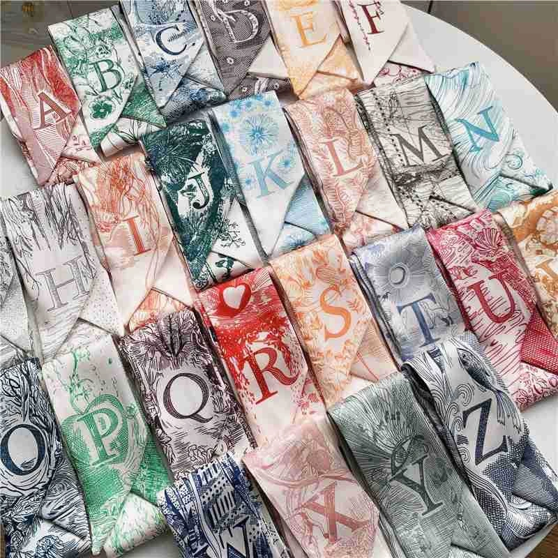 [CUCI GUDANG] SYAL MOTIF LETTER HURUF INISIAL ALFABET TWILLY PANJANG SELENDANG SATIN SILK SCARF LEHER WANITA KOREA AKSESORIS TAS SHAWL FLOWER PRINT PATTERN BLACK BRWON GREEN COLOR VARIASI MOTIF