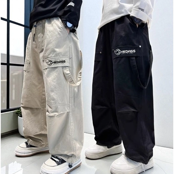 celana anak laki-laki musim semi musim gugur 2025 celana skena kasual kaki lurus baru celana kargo ukuran besar celana anak-anak keren yang trendi