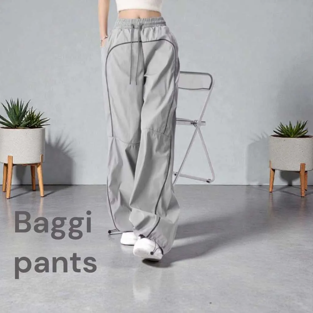 celana panjang baggy track pants parasut dengan list/sisi samping yang super-stylish,
