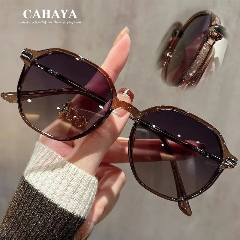Kacamata hitam bingkai bulat gaya Korea pelindung UV400 wanita
